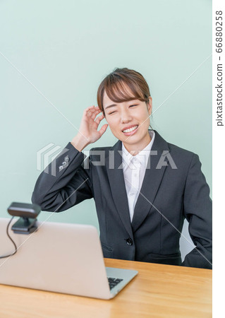 A young woman interviewing online using a webcam [Failure in job hunting] 66880258