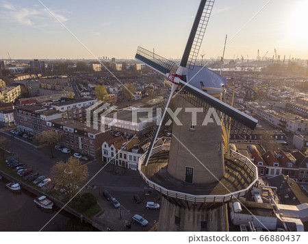 Beautiful windmill in Schiedam province South Holland, these highest windmill in the world also known as burner mills were used for grinding grain that was used for the Famous local Gin industry 66880437