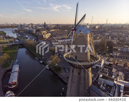 Beautiful windmill in Schiedam province South Holland, these highest windmill in the world also known as burner mills were used for grinding grain that was used for the Famous local Gin industry 66880438
