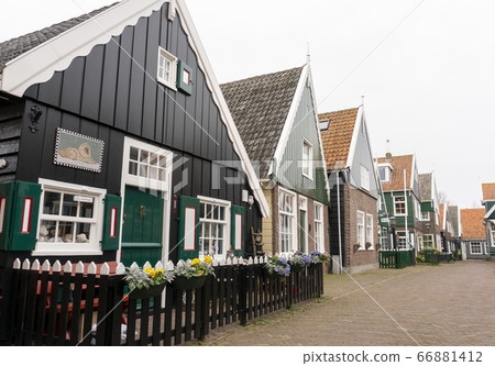 Typical Dutch village with beautiful wooden houses on the island of Marken in the Netherlands, Holland 66881412