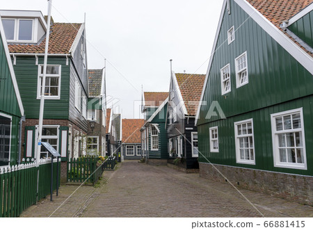Typical Dutch village with beautiful wooden houses on the island of Marken in the Netherlands, Holland 66881415