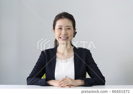 Business woman with headset Business woman with headset 66881872