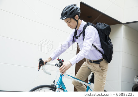 Men bicycle commuters 66882223