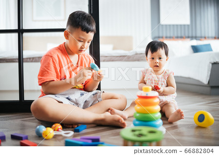 Kids playing at home 66882804