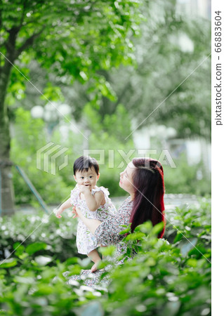 Mother and daughter outdoor having fun 66883604