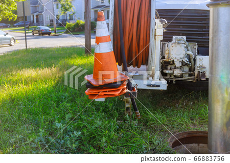Machine for cleaning sewer wells in the a town Machine for cleaning sewer wells in the a town 66883756