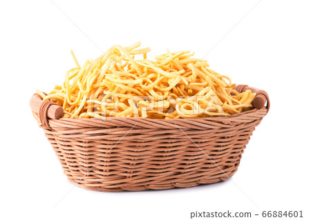 German raw spaetzle pasta in basket German raw spaetzle pasta in basket 66884601