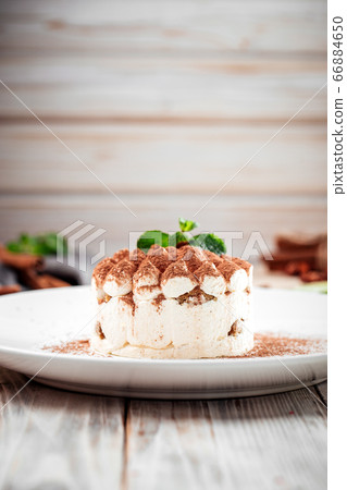Sponge cake with chocolate sprinkles and mint Sponge cake with chocolate sprinkles and mint 66884650