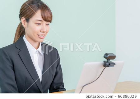 Young woman interviewing online using a webcam 66886329