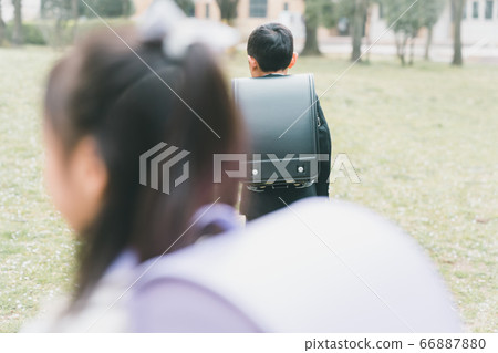 Elementary school student going to school Elementary school student going to school 66887880