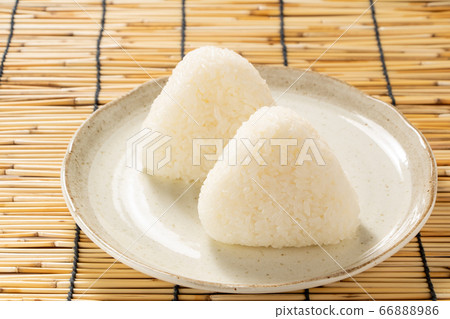 Rice balls and salted rice balls. Background, blinds. 66888986