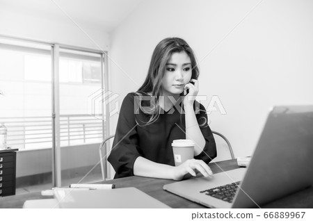 Telework young woman black-and-white photo cheek cane thinking Telework young woman black-and-white photo cheek cane thinking 66889967