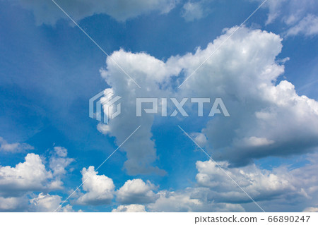 Gray clouds on blue sky background. Gray clouds on blue sky background. 66890247
