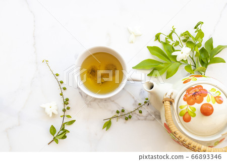 herbal healthy drinks hot chrysanthemum tea local flora of asia with teapot, flower jasmine ,purple in summer herbal healthy drinks hot chrysanthemum tea local flora of asia with teapot, flower jasmine ,purple in summer 66893346