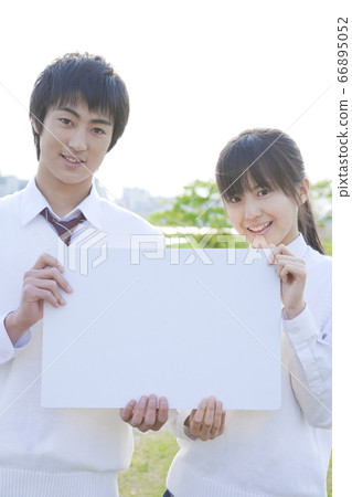 High school student with message board 66895052