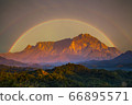 Beautiful Majestic Mount Kinabalu with rainbow background.  66895571
