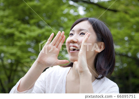 A woman shouting 66895751