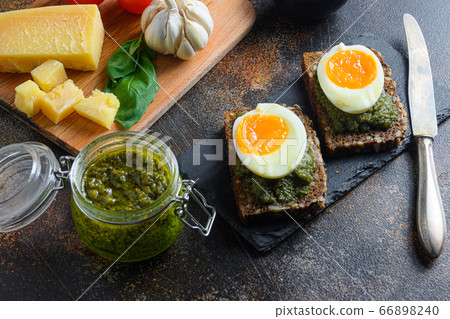 homemade eggs panini bread with Green basil pesto 66898240