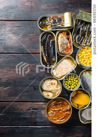 Assortment of canned preserves food in tin open 66898350