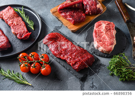 Organic denver, top blade, tri tip steak on a Organic denver, top blade, tri tip steak on a 66898356