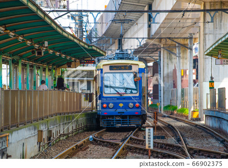 Tokyo cityscape in Japan, overlooking the Tokyo Sakura Tram (Toden Arakawa Line) in front of Oji Station Tokyo cityscape in Japan, overlooking the Tokyo Sakura Tram (Toden Arakawa Line) in front of Oji Station 66902375