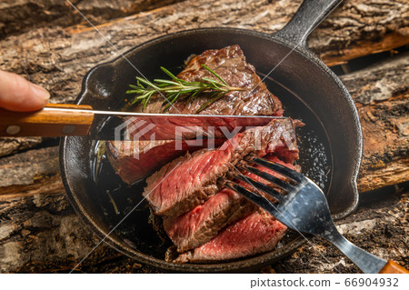 Steak thick slice of steak to enjoy outdoors 66904932