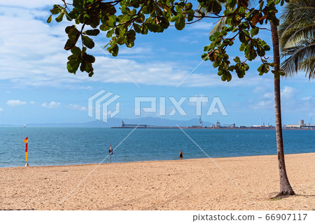 Beach Scene With Industrial Wharf In The Beach Scene With Industrial Wharf In The 66907117