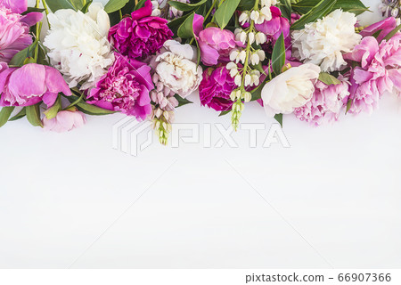 Beautiful floral frame of bunch of purple, pink, white peonies Beautiful floral frame of bunch of purple, pink, white peonies 66907366