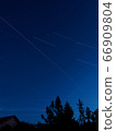 International Space Station and star trails seen from England 66909804