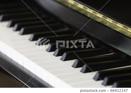 Close-up shot of piano keyboard background  66912147