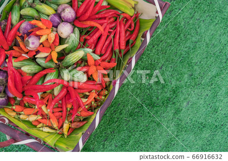 assorted raw vegetables with organic food in the basket. assorted raw vegetables with organic food in the basket. 66916632