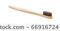 Wooden toothbrushes on a white background 66916724