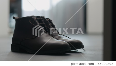 closeup brown leather chukka boots indoor closeup brown leather chukka boots indoor 66920892