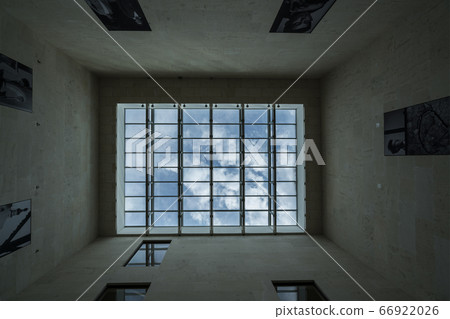 view of the sky through a grate on the ceiling view of the sky through a grate on the ceiling 66922026