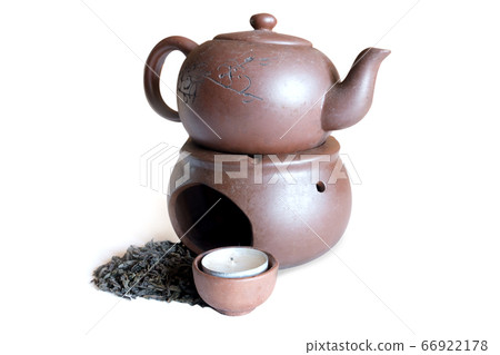 black tea and retro teapot on white background black tea and retro teapot on white background 66922178