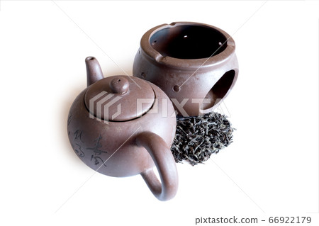 black tea and retro teapot on white background black tea and retro teapot on white background 66922179