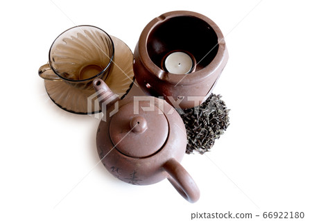 black tea and retro teapot on white background black tea and retro teapot on white background 66922180