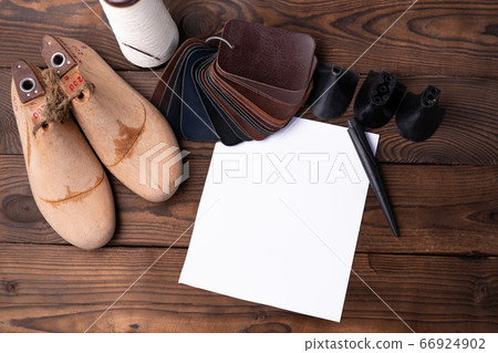 Leather samples for shoes and wooden shoe last on 66924902