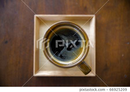 A happy cup of coffee. A happy cup of coffee. 66925209