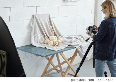 Photographing vegetable against fabric Photographing vegetable against fabric 66926388