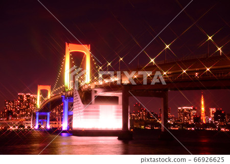 Tokyo Rainbow Bridge illuminated in rainbow colors Tokyo Rainbow Bridge illuminated in rainbow colors 66926625