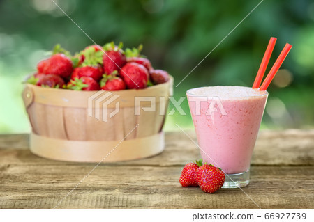 strawberry milkshake in glass strawberry milkshake in glass 66927739