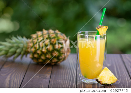 pineapple juice in glass 66927745