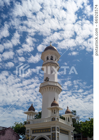 Minaret at Kapitan Keling Mosque. 66928574