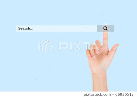 Finger touching find icon symbol on internet browsing engine screen. Finger touching find icon symbol on internet browsing engine screen. 66930512
