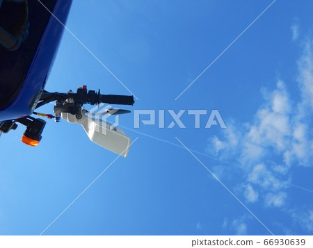 Looking at the sky from under the bike Looking at the sky from under the bike 66930639