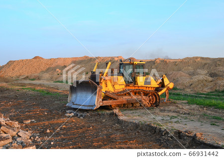 Bulldozer with bucket for pool excavation and utility trenching Bulldozer with bucket for pool excavation and utility trenching 66931442