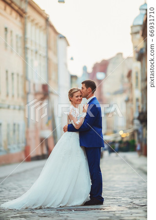 happy romantic young couple celebrating their marriage 66931710