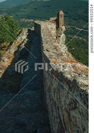 Pathway on stone wall with watchtower over ridge at Marvao Pathway on stone wall with watchtower over ridge at Marvao 66932014