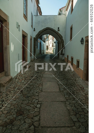 Old houses in cobblestone alley and passageway at Marvao 66932026